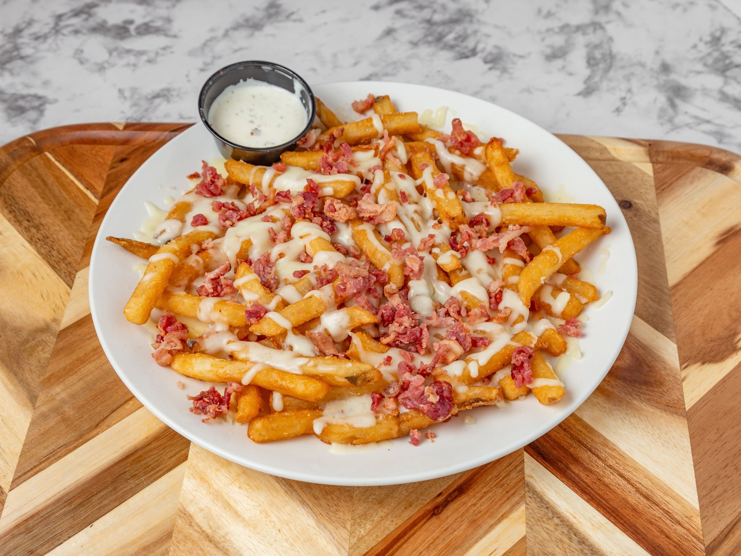French Fries with Cheese & Bacon.