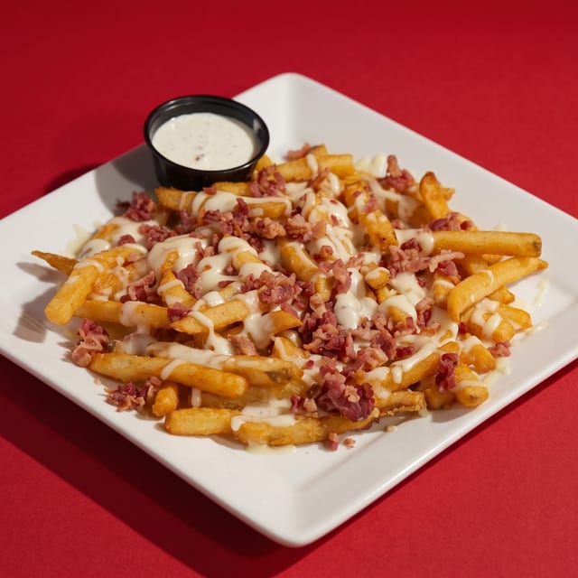 French Fries with Cheese & Bacon.